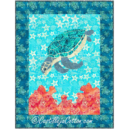 Bright quilt with a bright colored sea turtle diving into coral reef.