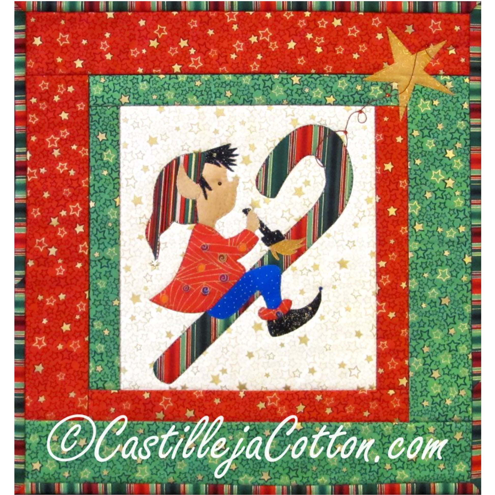 Adorable quilt features an elf with paintbrush riding a candy cane while they paint it.