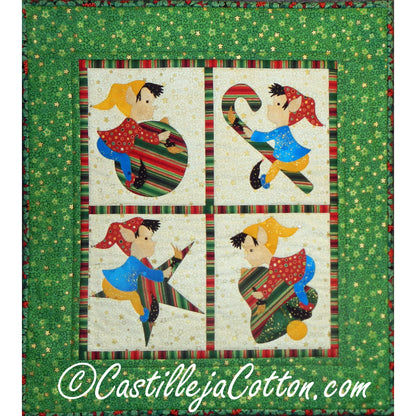 Wall hanging quilt features four squares of adorable elves. Each is riding a different ornament from a round bauble, candy cane, star and bell.