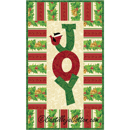 Mini Christmas wall hanging with the word Joy appliqued in green and red. A cardinal in a santa hat sits on top of the letter J.