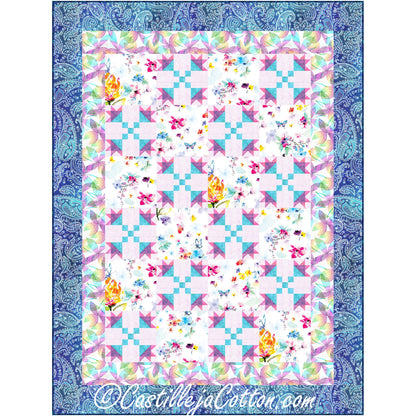 Colorful quilt with floral and butterfly patterns on a blue paisley border, featuring the brand 'Castilleja Cotton'.