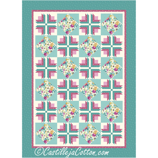 Beautiful quilt features alternating blocks which include four flowers in a square pattern and diamonds all in floral prints. Light green, pink and yellow with white background for flower blocks and borders of thin pink and then wider green that matches rest of green.