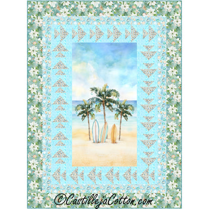 Seas Greeting quilt features a palm tree panel with a Christmas theme with a pieced fish border, which used pebble fabric.