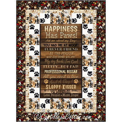 A quilt with the words "Happiness has paws" along with more afformations with dog and pawprints fabric and applique paw prints.