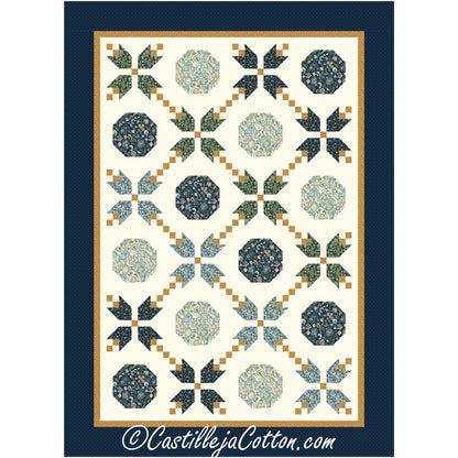 A blue and green quilt featuring a vibrant floral design.