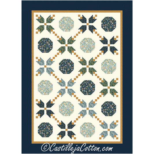 A blue and green quilt featuring a vibrant floral design.