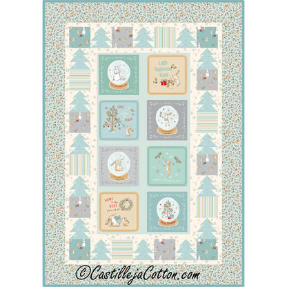 I Love You 2026 Pastel quilt features a panel with simple tree borders blocks alternating with plain squares. Christmas themed with the snow globes and wreath and cute bunnies.