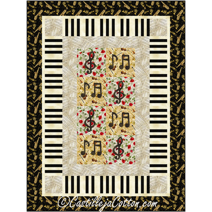 Music quilt includes music notes and cleft on blocks of musical fabric with a piano keyboard border followed by a final border of musical instruments.