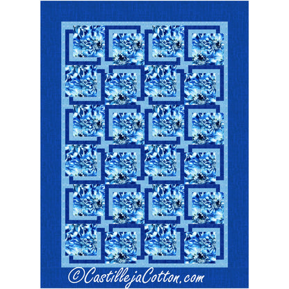 A stunning quilt featuring a combination of blue and white colors, embellished with lovely blue and white flowers.