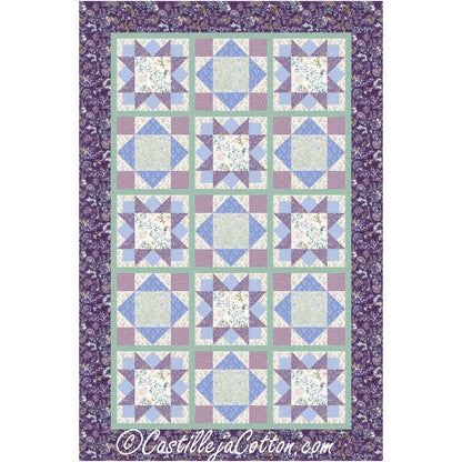 Beautiful quilt in purple, blue, green, and cream with squares of Ohio Stars and diamonds. Both have fabric inside making it a fun design.