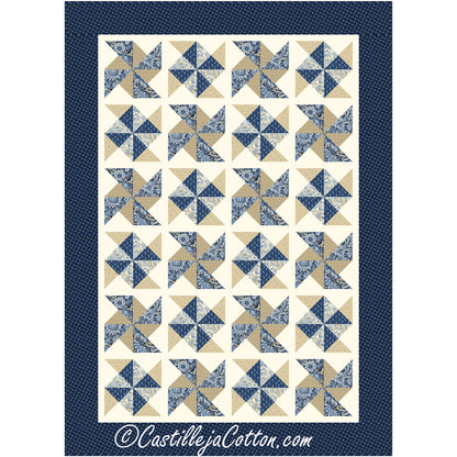 Adorable blue and tan pinwheels quilt. Pinwheels are on a cream background with blue border.