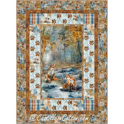 Foxies on the Prowl quilt features three foxies panel with paw print borders alternating with motif blocks. 