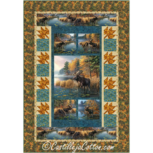 Fun nature quilt uses a Moose panel  with leaf block borders alternating with water blocks.