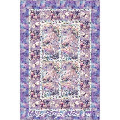 Dragonflies and Wildflowers quilt features a floral center with fusible appliqued dragonflies with alternating plain blocks pieced borders.