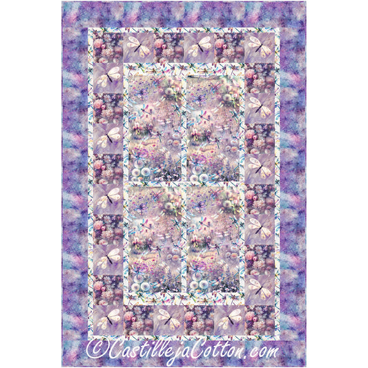 Dragonflies and Wildflowers quilt features a floral center with fusible appliqued dragonflies with alternating plain blocks pieced borders.