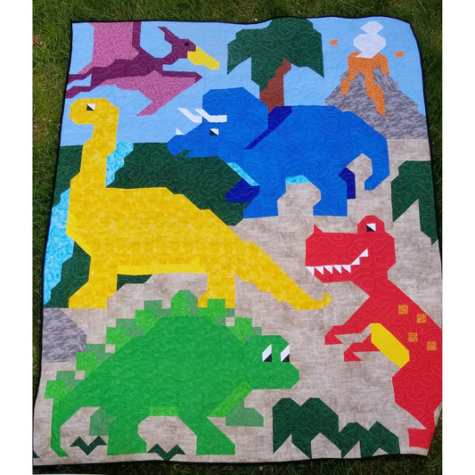 This quilt features 5 dinosaur friends in a collage style image. 