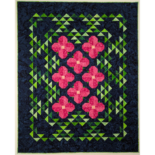 Quilt looks like a blanket of flowers in the middle with triangular leaves coming off it. 
