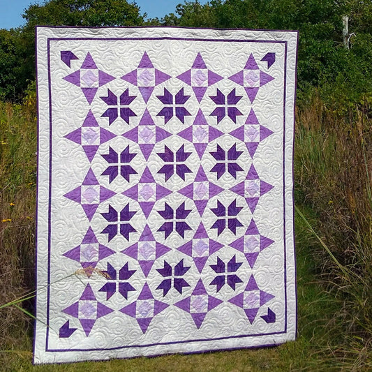 Image of the Stellar Breeze quilt by Canuck Quilter Designs.