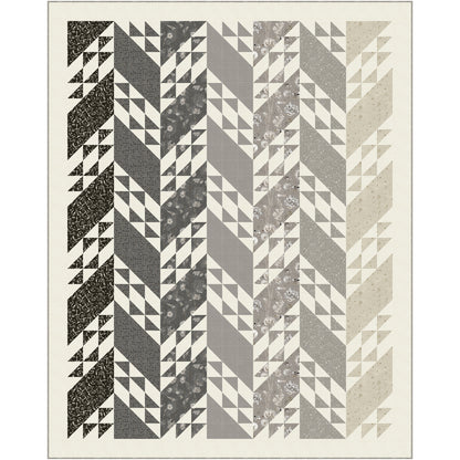 Quilt features rows of solid slanted rectangles and ones filled with triangles.  The left rows are darker than the ones on the right.