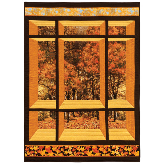 Quilt featuring a window design with a fall woods scene. Pattern  designed for pre-printed panels or large scale fabrics.