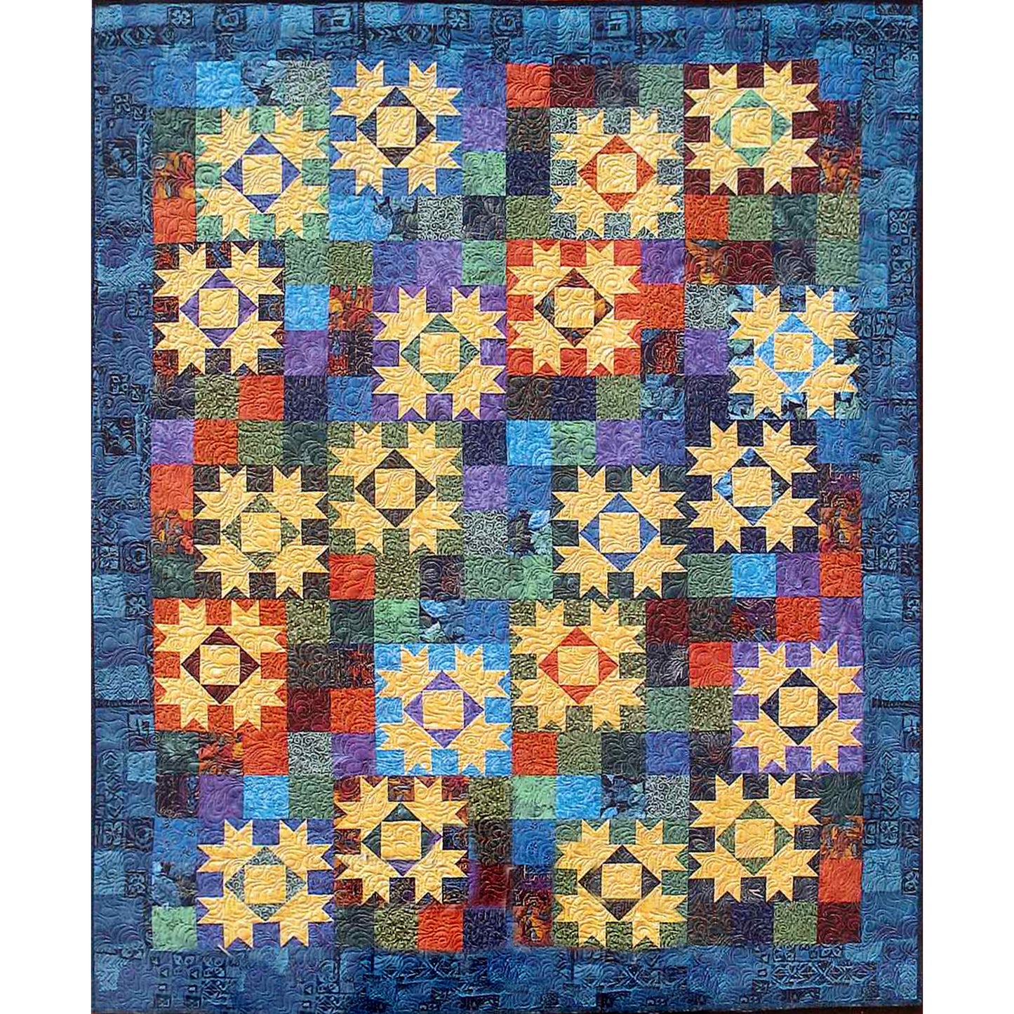 Colorful quilt called The Journey Home by Debbie's Creative Moments with geometric pattern on a blue background.