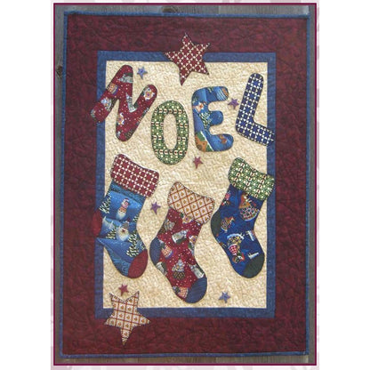Festive quilt features three stockings in adorable Christmas fabric and matching letters to spell out NOEL on top.