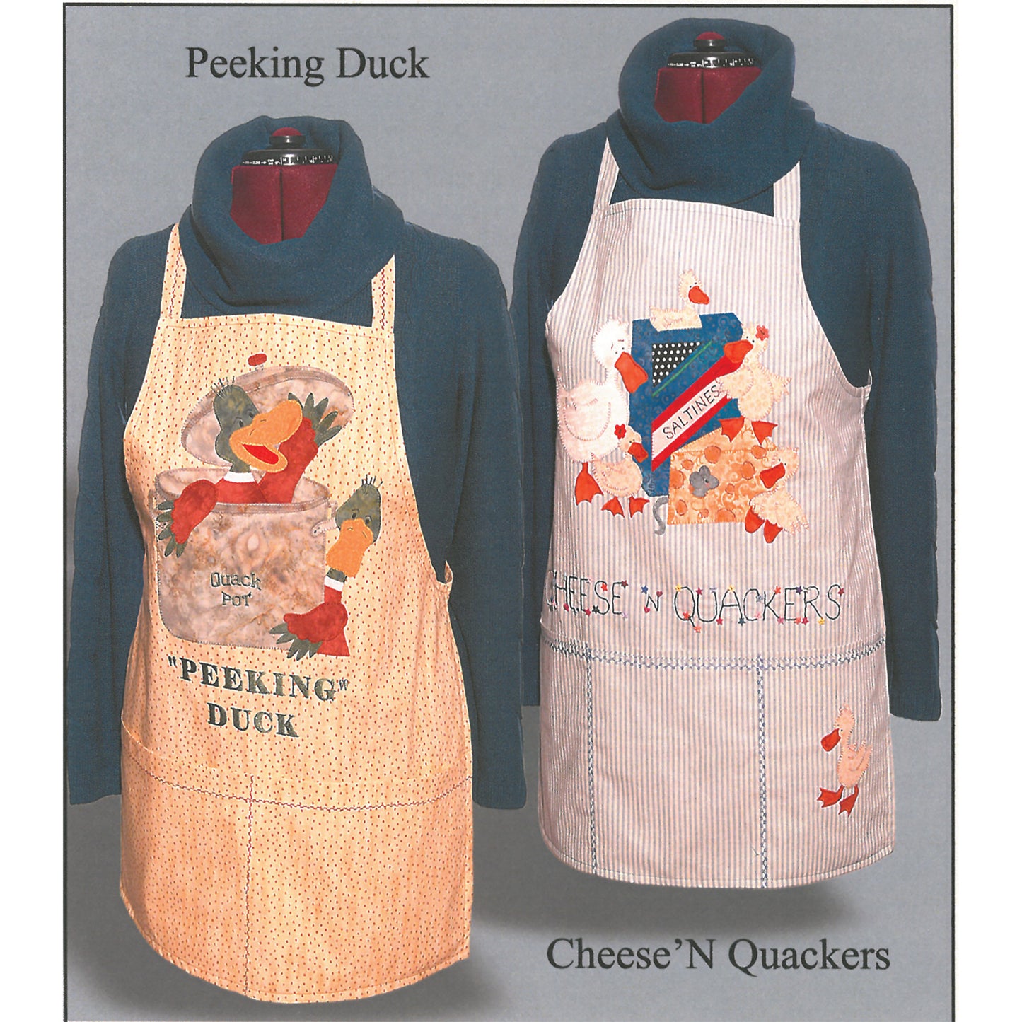 Adorable aprons showcased on mannequin bodies are a cute way to save your clothes while cooking and baking. Each has a silly design with saying. One is "Peeking Duck" with duck coming out of a pot, while another duck holds the pot. The other shows saltine crackers, a cheese with mouse, and a few cute ducks and says "Cheese'N Quackers".