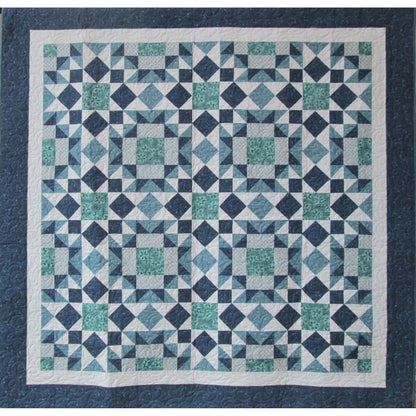 Fun stars, squares and diamonds quilt in blues and greens.