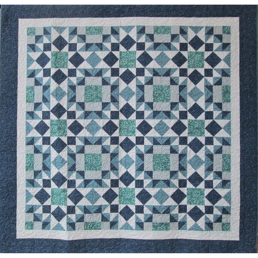 Fun stars, squares and diamonds quilt in blues and greens.