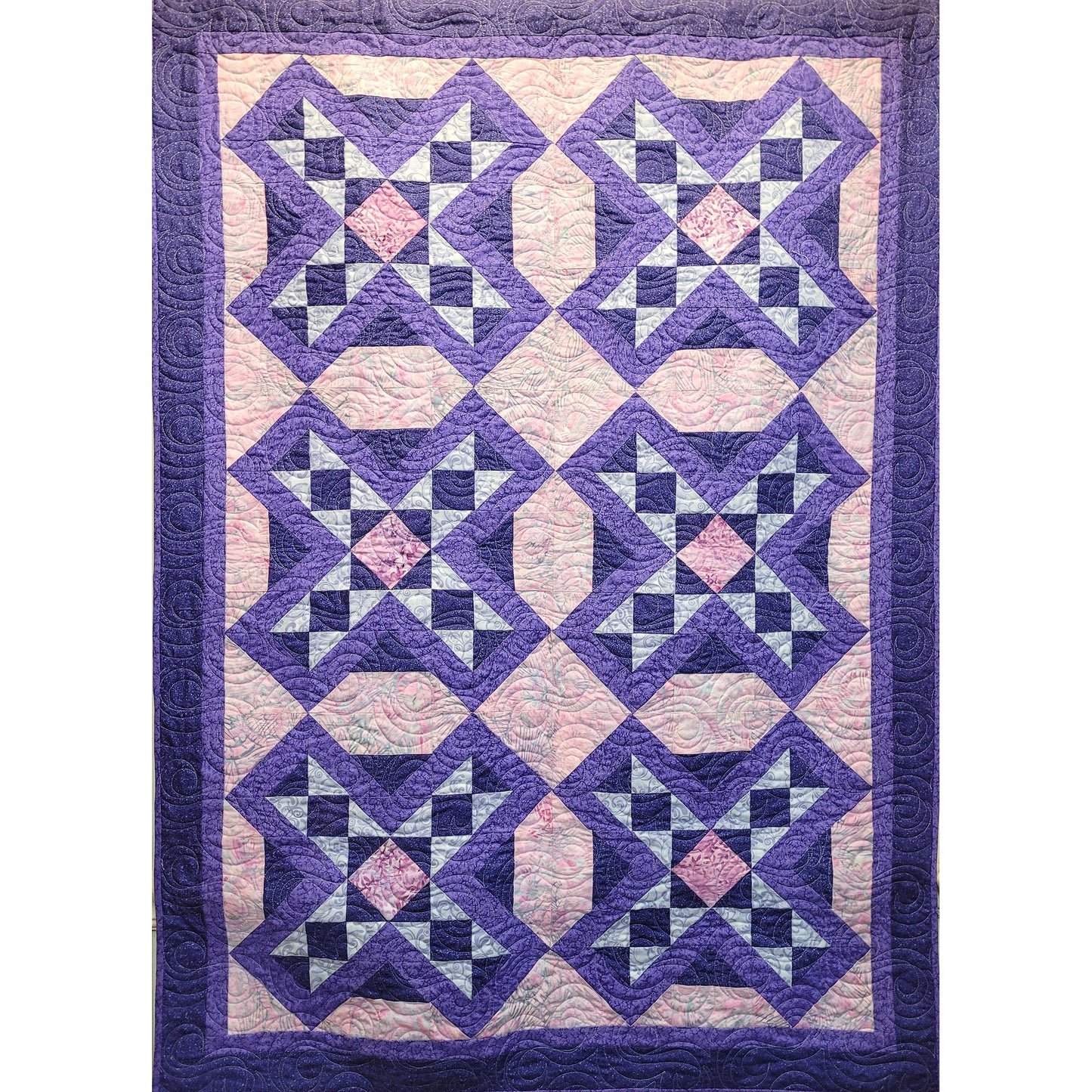 The blocks of this beautiful quilt was inspired by staurolite crystals found in the Appalachian Mountains of Virginia. Legend says they are formed from fairy tears.
