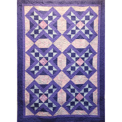 The blocks of this beautiful quilt was inspired by staurolite crystals found in the Appalachian Mountains of Virginia. Legend says they are formed from fairy tears.