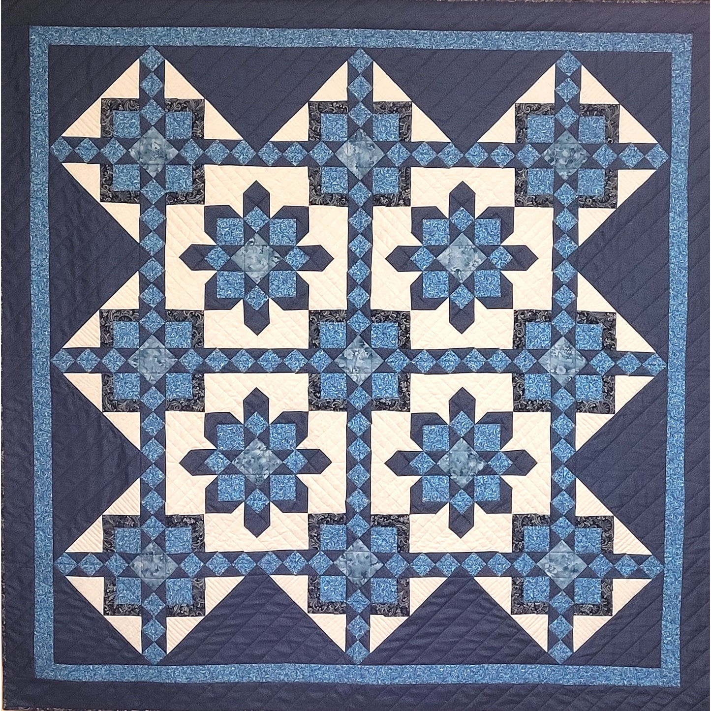 Moroccan Stars quilt is a beautiful with stars and diamonds and squares in squares.