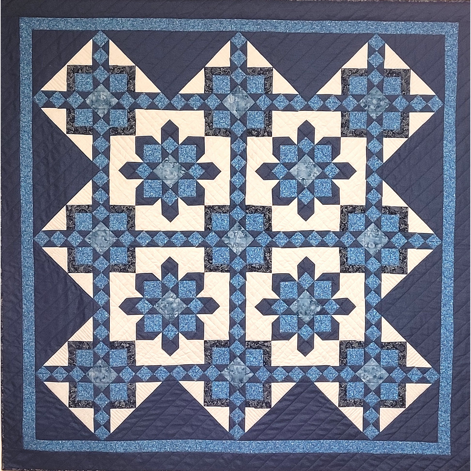 Moroccan Stars quilt is a beautiful with stars and diamonds and squares in squares.