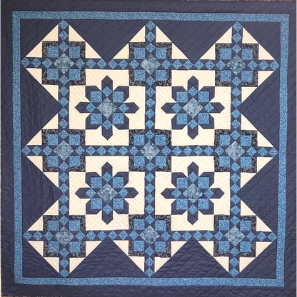 Moroccan Stars quilt is a beautiful with stars and diamonds and squares in squares.
