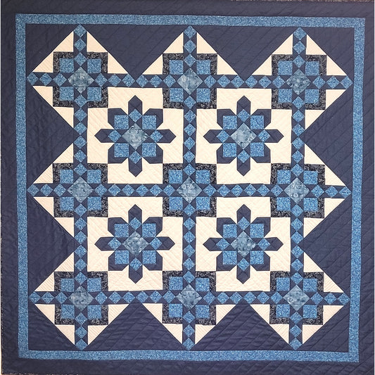 Moroccan Stars quilt is a beautiful with stars and diamonds and squares in squares.