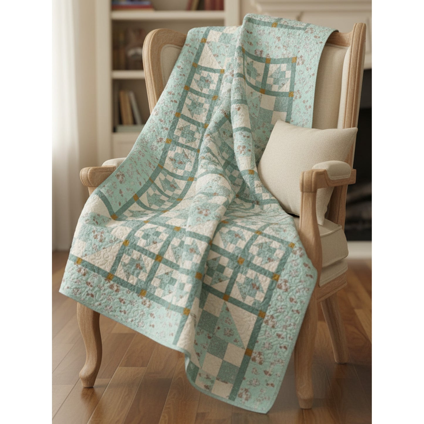 Quilt with a geometric pattern draped over a wooden chair in a room setting.