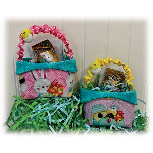 Two adorable Easter mini baskets include Easter print fabric. Basket handle includes an adorable matching chick button and each basket is filled with small treats.