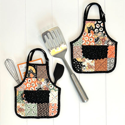 Cutest hot pads look like mini aprons!  Orange and black fabrics used in image shown.