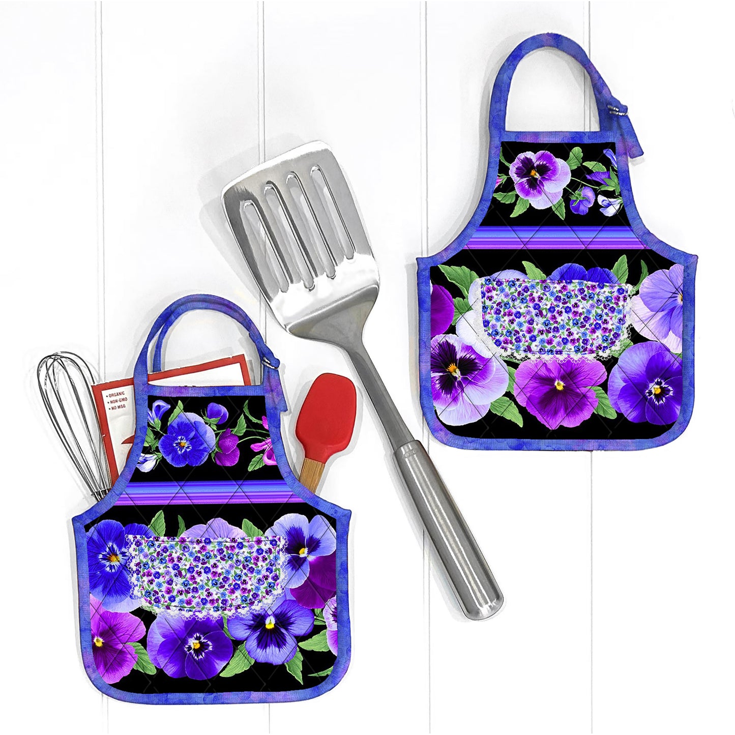Cutest hot pads look like mini aprons!  Pansy fabric in purple and blue used in image shown.