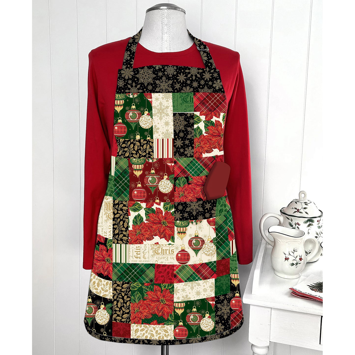 Fun charm pack apron showcasing Christmas prints.