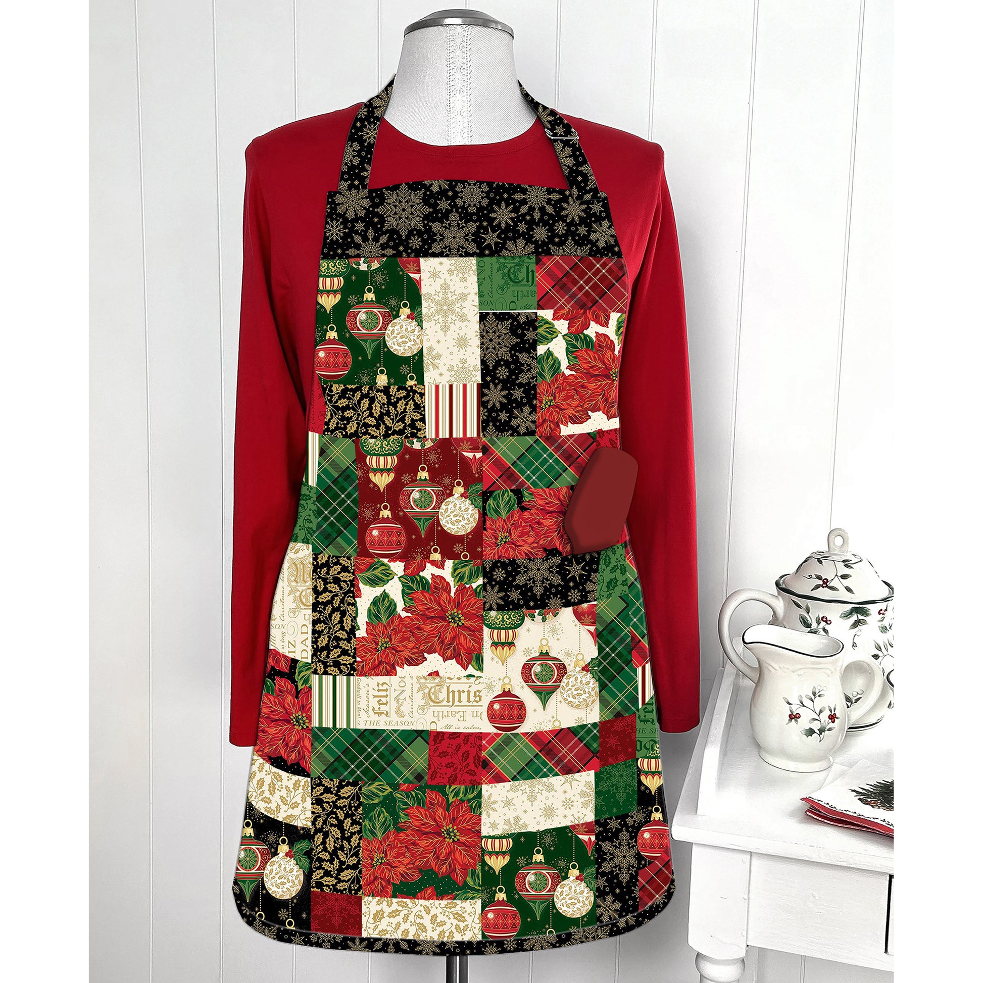 Fun charm pack apron showcasing Christmas prints.