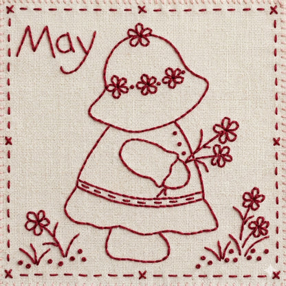 Sunbonnet Sue redwork embroidery design for May featuring Sunbonnet Sue picking a bouquet of flowers.