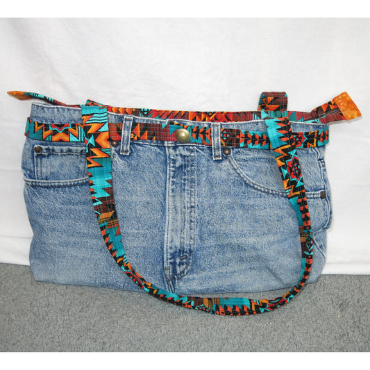 Up-cycled jeans to an adorable purse, bag or tote with handle.