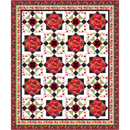 A striking red, black, and green diamonds on this beautiful quilt are meant to look like poppies in the spring.