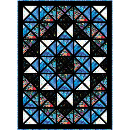 This quilt looks like a stained glass window with shades of blue.