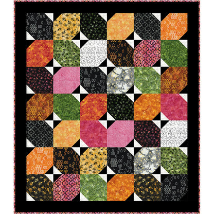 Cheerful quilt that celebrates the charm of bees, blossoms, and honeycomb-inspired prints. Large angled blocks create a lively secondary design while allowing the beautiful batiks to take center stage. 