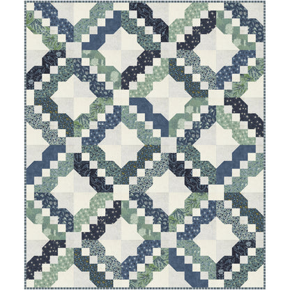 Take a relaxing stroll along the shore with Seaside Trail, a striking quilt that creates the illusion of winding coastal pathways framed by crisp star-like openings. Interlocking curves, soft angles, and sparkling secondary designs give this quilt beautiful movement.