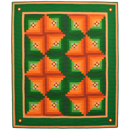 This is a fun orange and green quilt featuring small stars and blocks of variegated orange with green to finish off each block. But it's a block in a block with actual log-cabin block around each star with orange and green making it look like it's been built differently.  Really pretty!