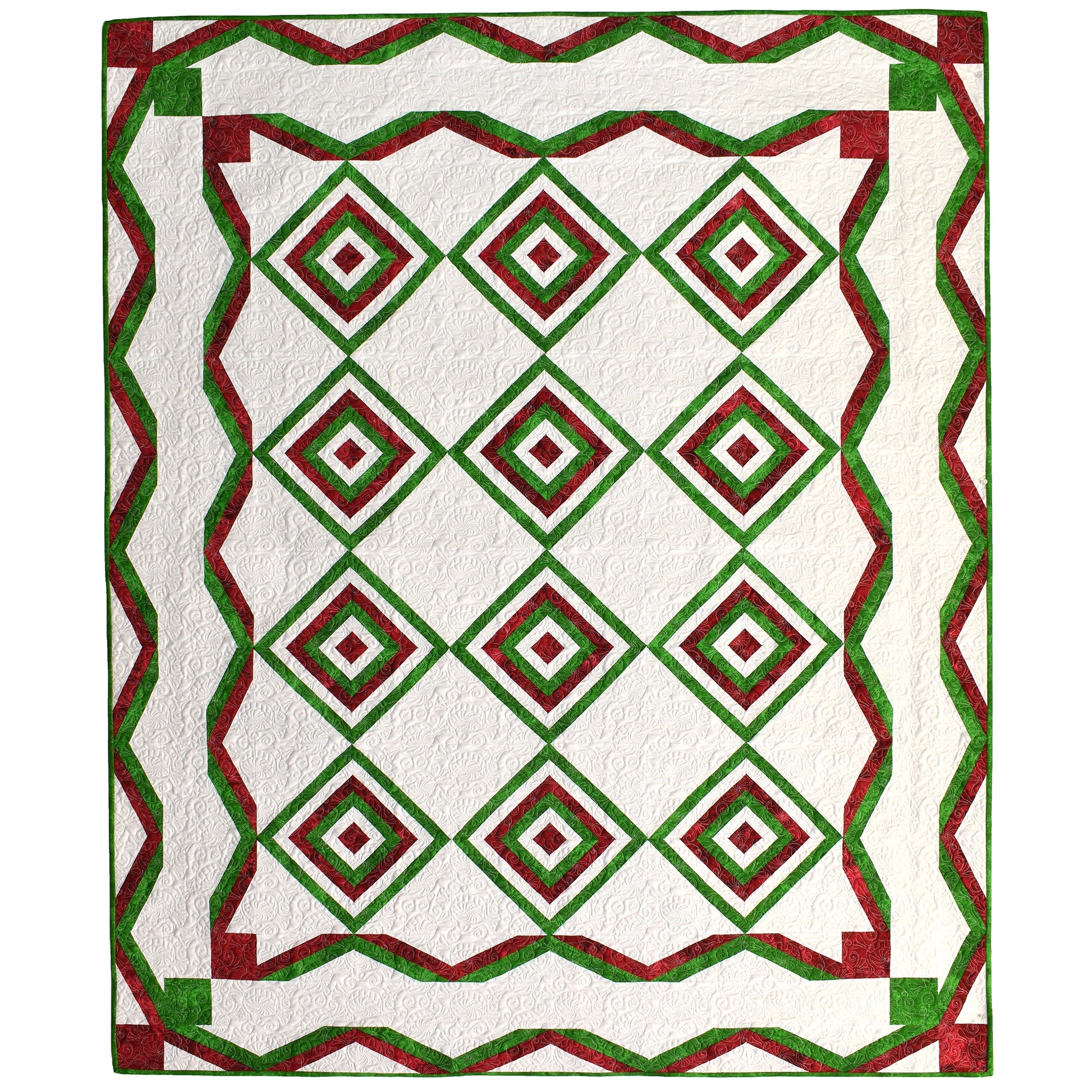 This festive quilt features classic geometric blocks in red, green, and white. Designer calls it wrapping ribbon around peppermints. Inside peppermint diamonds are in red, green and white with red and green ribbons bordering the entire quilt.