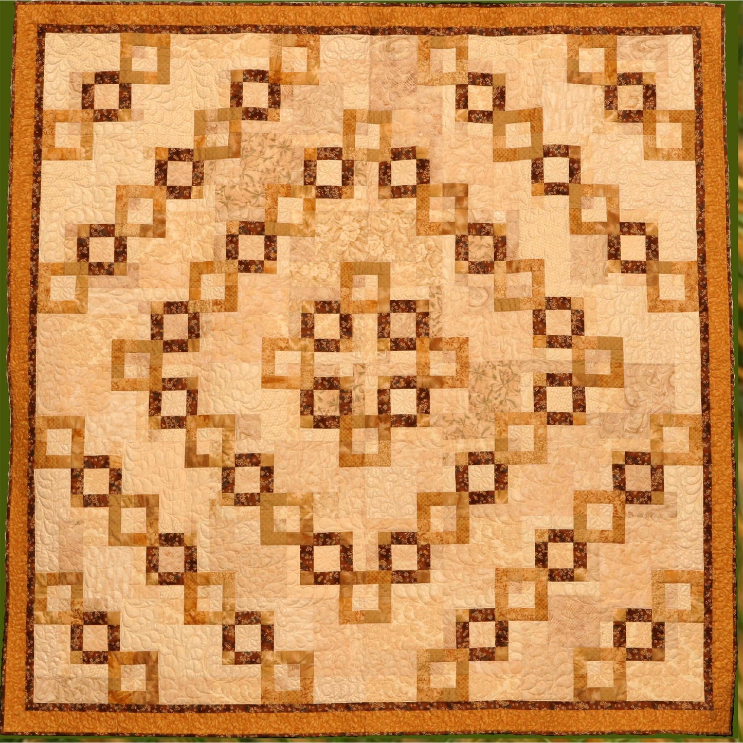 Golden chains make a romantic statement in this elegant and dramatic quilt.